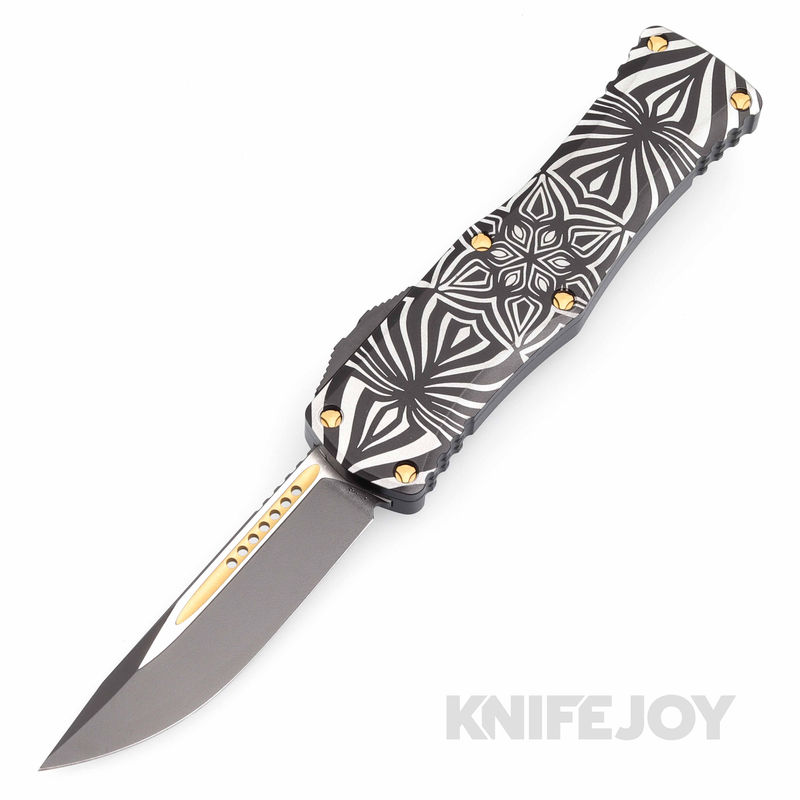 MICROTECH 703-1TSOS Hera Auto OTF Signature Series 2Toned Black with Gold Accents Blade with Source Artwork Black Aluminum/ Bronze Handles