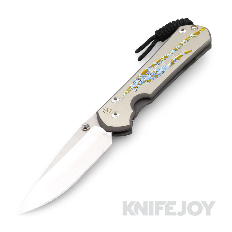 Chris Reeve Knives Large Sebenza 31 Drop Point Magnacut Blade with Unique Graphic/ Titanium Handles
