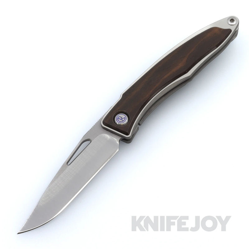 Chris Reeve Knives Mnandi with Magnacut Clip Point Blade and Titanium Handles with Macassar Ebony Inlay