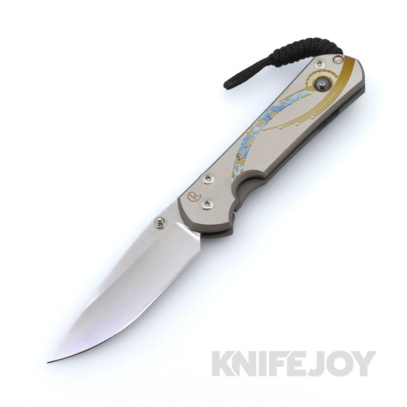 Chris Reeve Knives Large Sebenza 31 Drop Point Magnacut Blade with Unique Graphic Handles and Hematite Accent