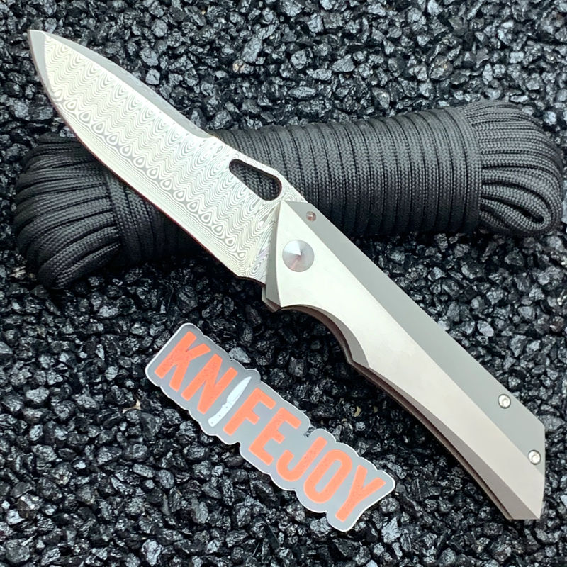 Marsh Custom Knives Custom Pickle Polished Damasteel Blade with Tapered Titanium Frame/ Multi-Faceted Handle Differentially Finished Handles