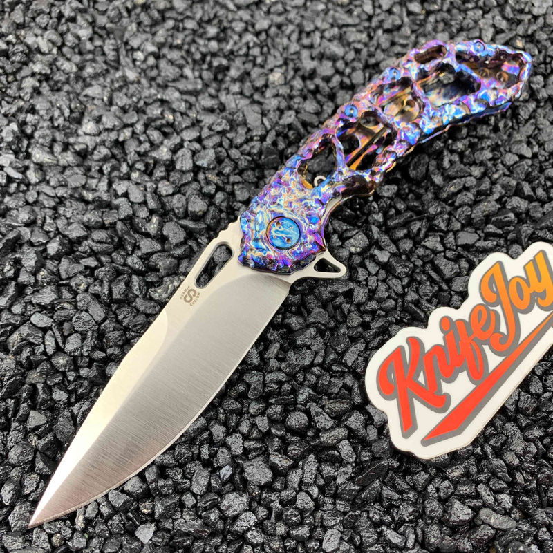 Olamic Cutlery Custom Wayfarer 247 M390 DropPoint Blade/ Funky Holes Volcanic Finish with Entropic Accents