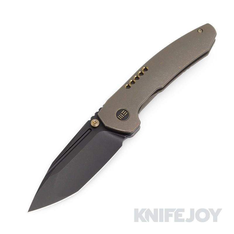 We Knife - 22002-2 Trogon Thumb Stud Black Stonewashed Blade with Bronze Titanium Handles