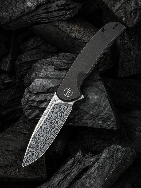 We Knife 20061B-DS1 Beacon Knife Hakkapella Damasteel Blade with Black Titanium Handles