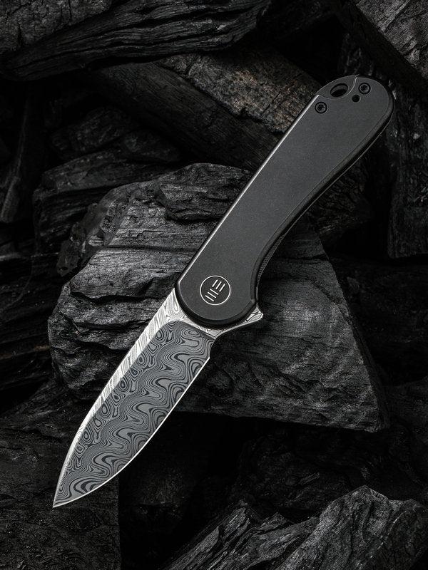 We Knife 18062X-DS1 Elementum Hakkapella Damasteel Blade with Black Titanium Handles