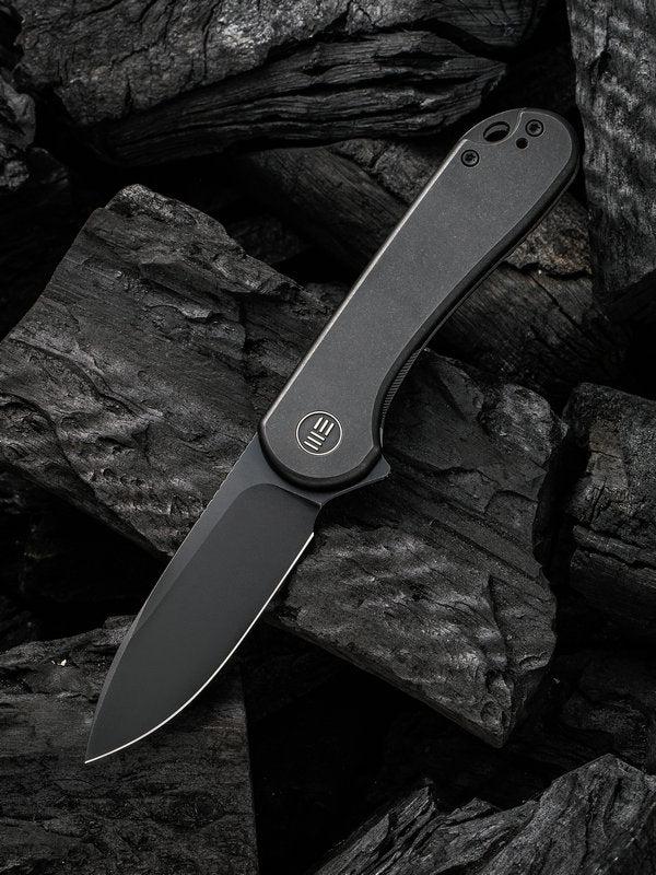 We Knife 18062X-3 Elementum Black Stonewashed Blade with Black Titanium Handle