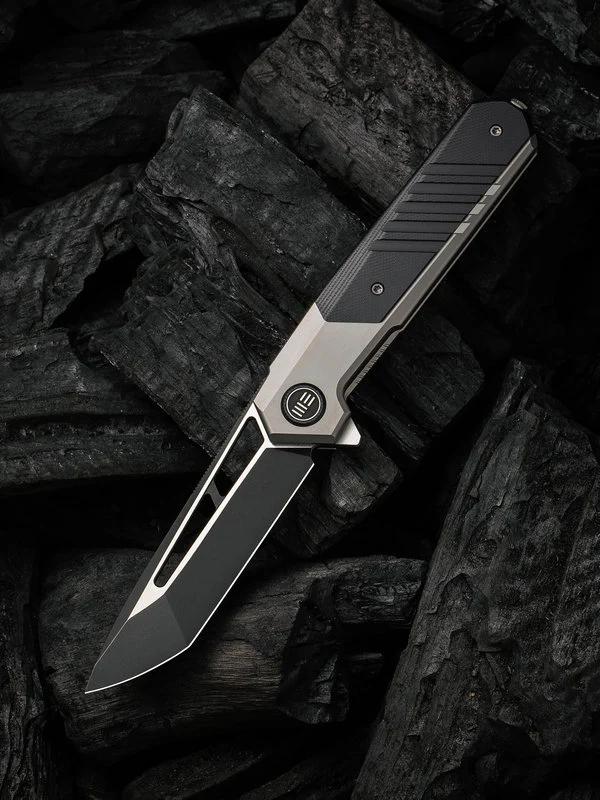 We Knife - 20073-3 Arsenal Frame Lock Black Stonewash Blade with Gray Ti Handle/ Black G10 Spacer