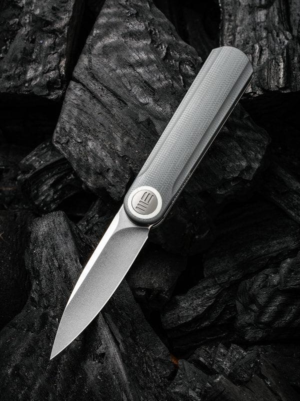 We Knife - Eidolon 19074A-A  Drop Point Front Flipper with Gray G10 Handles