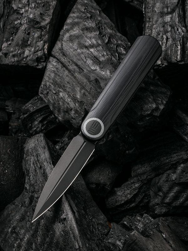We Knife -Eidolon 19074B-B Dagger Front Flipper Black Blade with Black G10 Handles