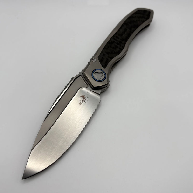 Pre-Owned Microtech ANAX Titanium Integral Hand Rubbed Satin M390 w/ Blue Titanium Pivot Collars & Carbon Fiber Inlay 190C-4CFITI