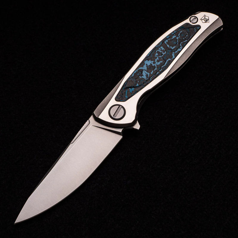 F95R NL – M390 BLADE – STONEWASHED TITANIUM HANDLE W- “ARCTIC STORM” CARBON FIBER INLAY- MRBS