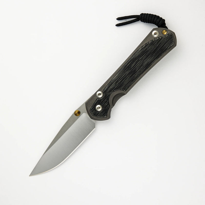 LARGE SEBENZA 31 BLACK CANVAS MICARTA INLAY – POLISHED CPM MAGNACUT BLADE – GOLD DOUBLE THUMB LUGS
