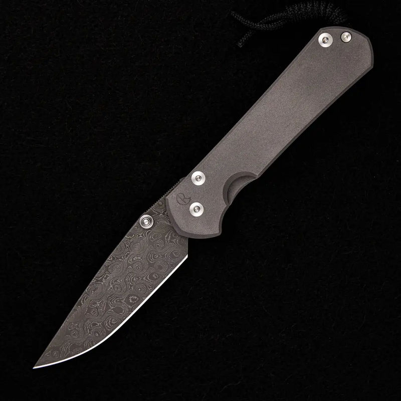 LARGE SEBENZA 31 – SILVER DOUBLE THUMB LUGS – RAINDROP BLADE