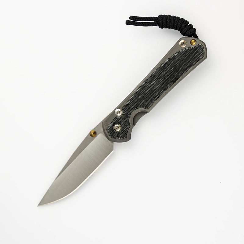 SMALL SEBENZA 31 BLACK CANVAS MICARTA INLAY – POLISHED CPM MAGNACUT BLADE – GLASS BLASTED – GOLD DOUBLE THUMB LUGS