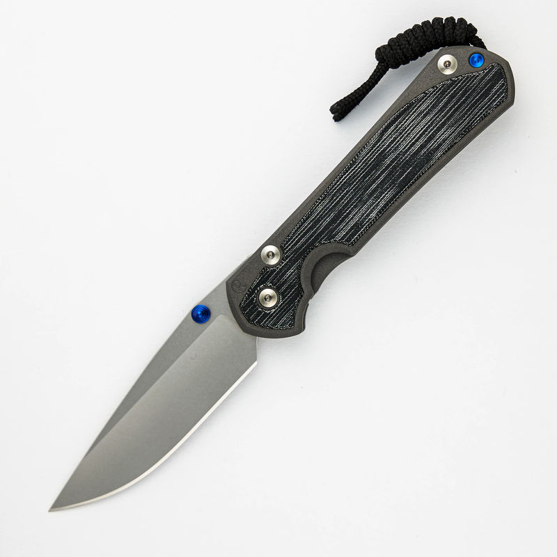 LARGE SEBENZA 31 BLACK CANVAS MICARTA INLAY – CPM MAGNACUT BLADE – BLUE DOUBLE THUMB LUGS