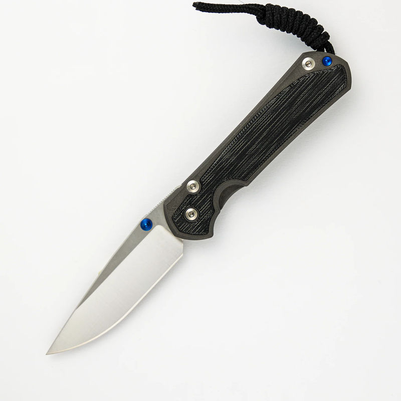 LARGE SEBENZA 31 BLACK CANVAS MICARTA INLAY – POLISHED CPM MAGNACUT BLADE – BLUE DOUBLE THUMB LUGS