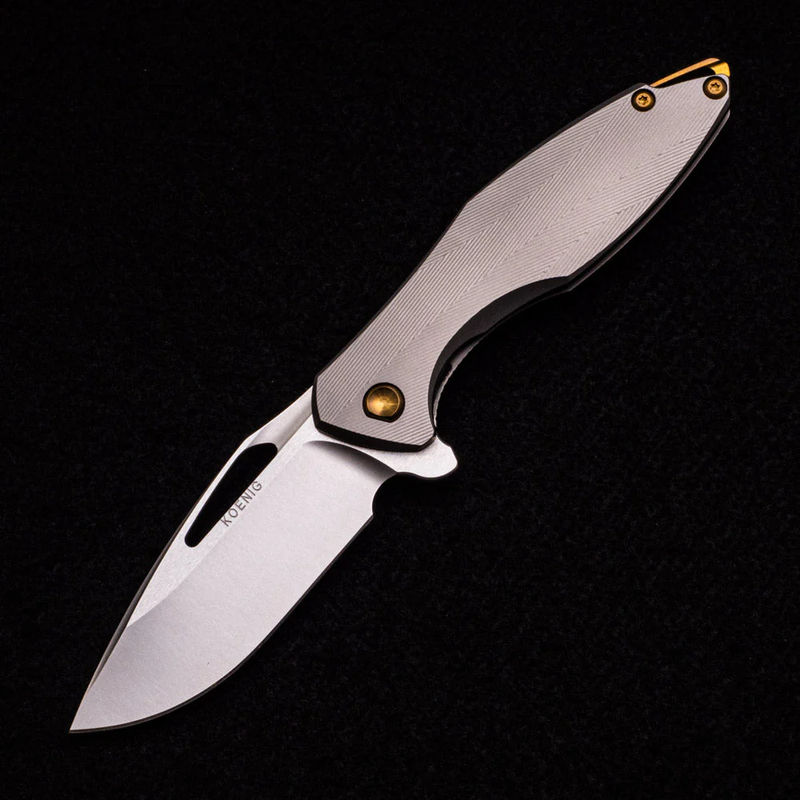 ARIUS – TEXTURED TITANIUM HANDLE – BRONZE HARDWARE – BURNISHED W- POLISHED FLATS 20CV BLADE