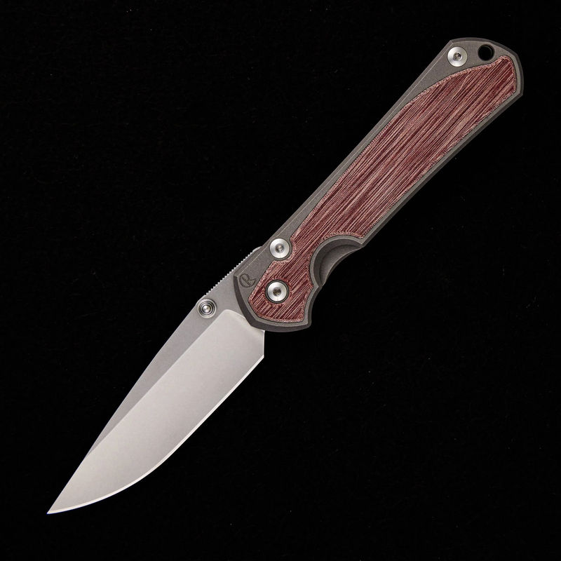 LARGE SEBENZA 31 RED LINEN MICARTA INLAY – DROP POINT BLADE – SILVER SINGLE THUMB LUG