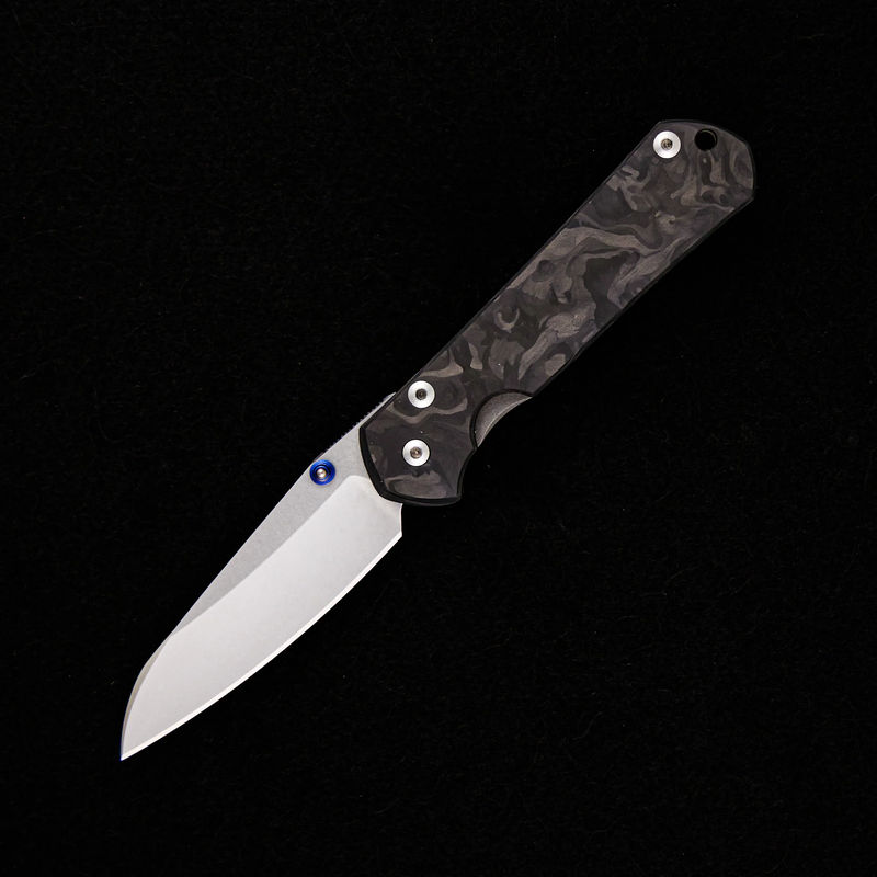 SMALL SEBENZA 31 – TITANIUM/MARBLE CARBON FIBER HANDLE – MAGNACUT INSINGO BLADE – BLUE SINGLE LUG
