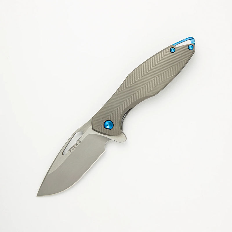 Mini Arius - Patterned Titanium Handle - Blue Hardware -  Burnished W/ Polished Flats M390 Blade