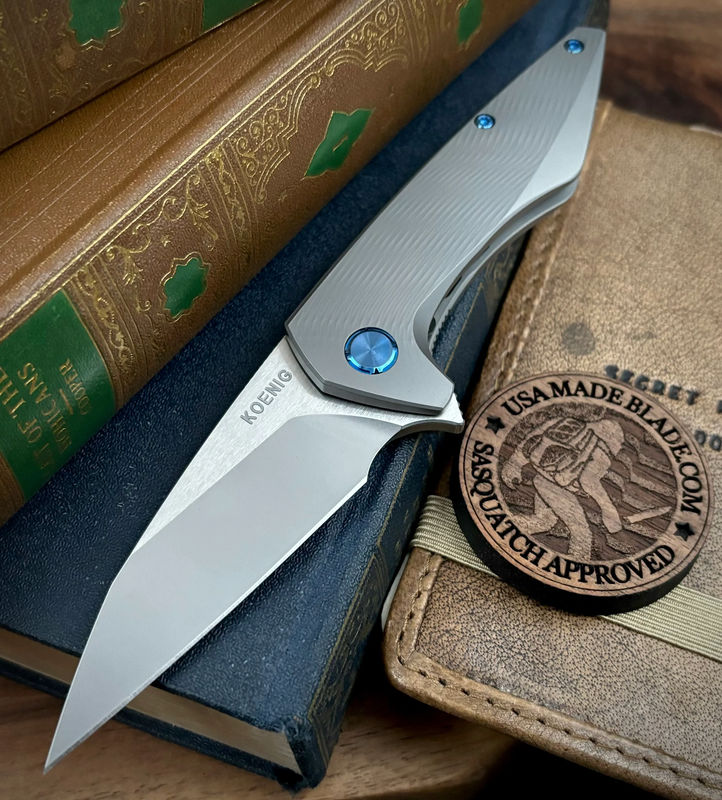 Koenig Mini Goblin Birghtwash M390 Blade with Polished Flats with Sea Pattern Full Ti Handles, Blue Ti Back Spacer, Blue Ti HW and Blasted Clip