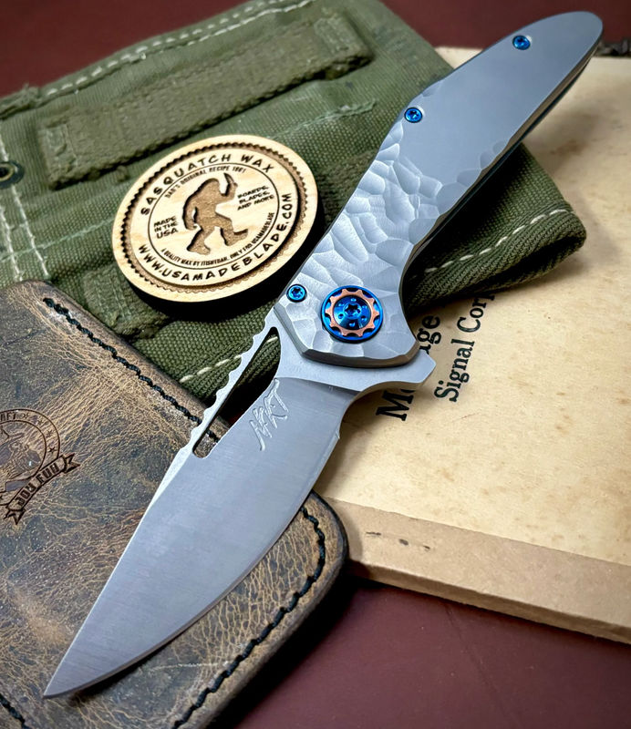 NK&T Custom Hydra Framelock with 5/32 Magnacut Blade, Rock Textured Flow to Smooth Handles, Blue Ti Hardware and Copper Pivot Collar