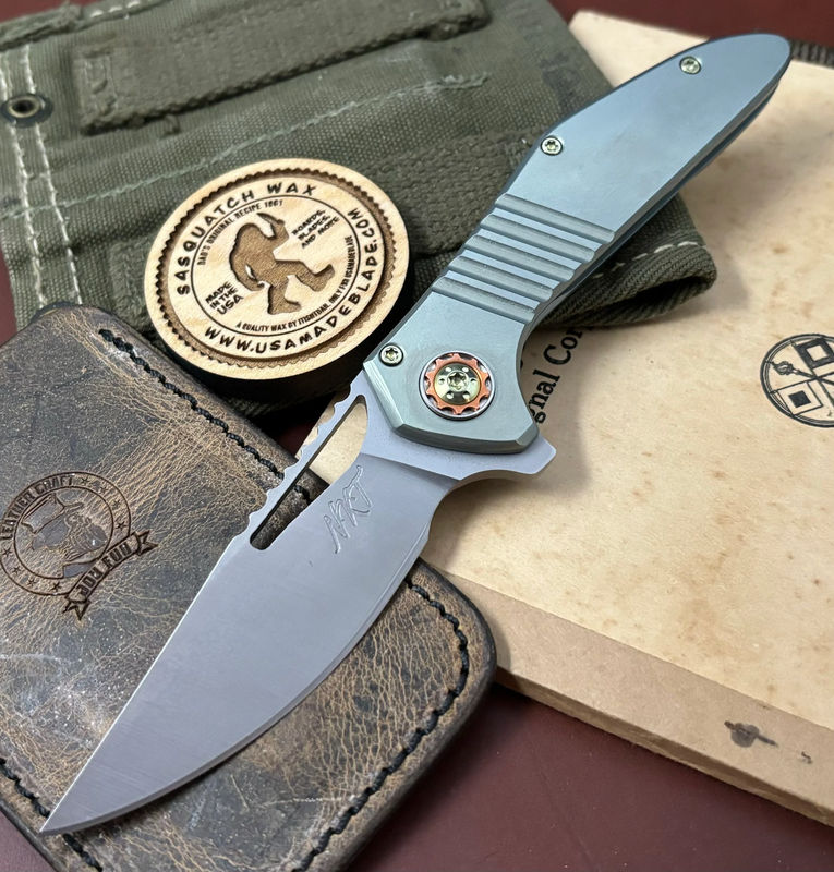 NK&T Custom Hydra Framelock with 5/32 Magnacut Blade, Light Green Ti Grooved Handles, Yellow Ti Hardware and Copper Pivot Collar