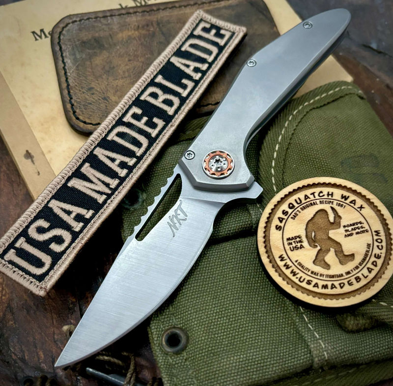 NK&T Custom Hydra Framelock with 5/32 Magnacut Blade, Ti Frame Handles, Ti Hardware and Copper Pivot Collar