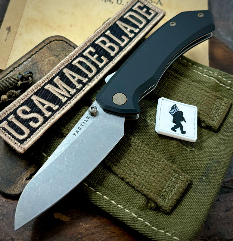 Chupacabra from Tactile Knife Company Tumbled Magnacut with Black Aluminum Scales and Bronzed Out Ti Hardware and Ti Lynch Clip